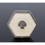 Silver ivory and marcasite mounted pill pot and cover, of hexagonal form, the lid decorated with a