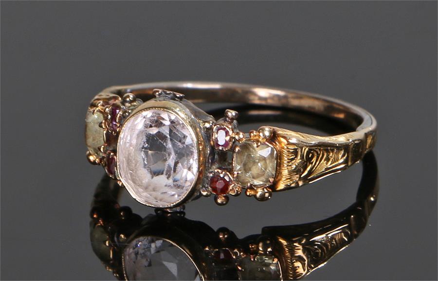 Victorian topaz ring, with a central pink topaz flanked by garnets, ring size O