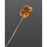 Citrine stick pin, with an emerald cut citrine above a pin