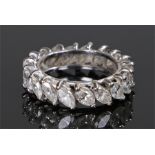 Diamond eternity ring, the ring set with nineteen marquise cut diamonds, ring size J
