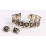 Siam silver bracelet, with eleven panels, together with a pair of earrings, (3)