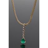 18 carat gold emerald and diamond pendant, with a row of six diamonds to the bar leading to the pear