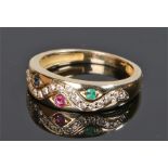 18 carat gold diamond ruby sapphire and emerald ring, the diamonds set to wavy line with round cut