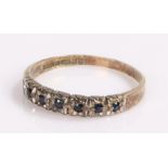 9 carat gold ring, set with sapphires, ring size P 1/2