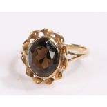 9 carat gold ring, set with a quartz to the head and a wavy edge, ring size K