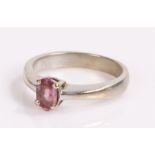 9 carat white gold ring, the ring set with a purple/pink stone to the 9 carat gold shank, ring