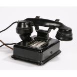 Desk telephone with black bakelite handset numbered 164 61, the bakelite base with five push buttons