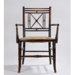 Edwardian child's elbow chair, in the style of William Morris, with spindle turned and roundel