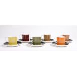 Susie Cooper coffee set, consisting of six individually coloured coffee cups and six black and white