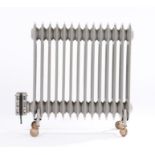 Dimplex cast iron electric radiator, on casters, 64cm wide