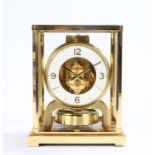 Jaeger LeCoultre Atmos clock, the white chapter ring enclosing a skeletonised centre, serial