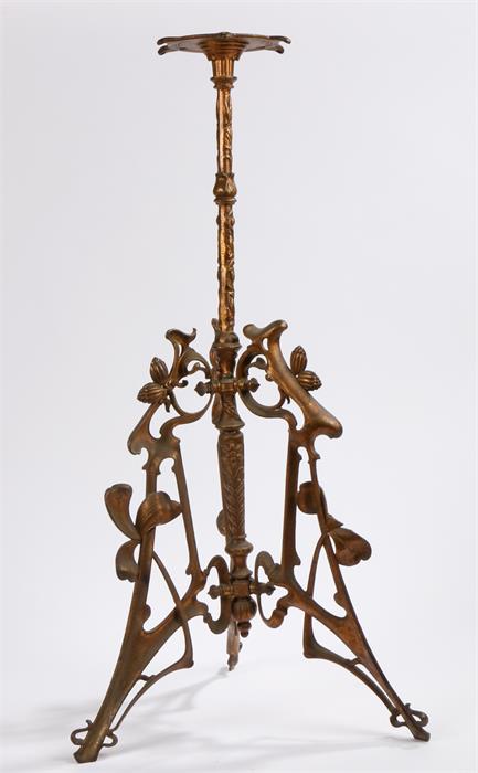 Gilt cast iron table base in the style of Louis Comfort Tiffany, the central foliate cast stem