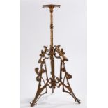 Gilt cast iron table base in the style of Louis Comfort Tiffany, the central foliate cast stem