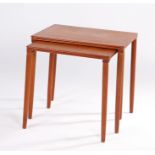 Nest of two teak tables, on turned legs, 55cm wide