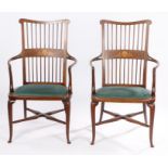 Pair of Edwardian marquetry inlaid armchairs, with line inlaid cresting rails, turned spindle