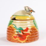 Clarice Cliff Bizarre 'Nasturtium' beehive shape honey pot and cover, with a bee forming the