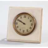 Early 20th Century ivory mounted desk strut timepiece, the ivory frame with a champagne dial, Arabic