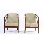 Pair of Art Deco easy chairs, with upholstered backs and seats, down swept arms and arm supports, on