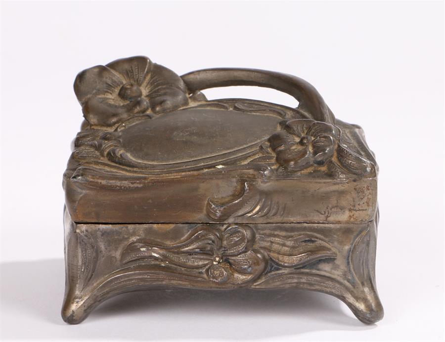 Art Nouveau metal box and cover, the hinged lid with cast floral decoration, 8cm wide