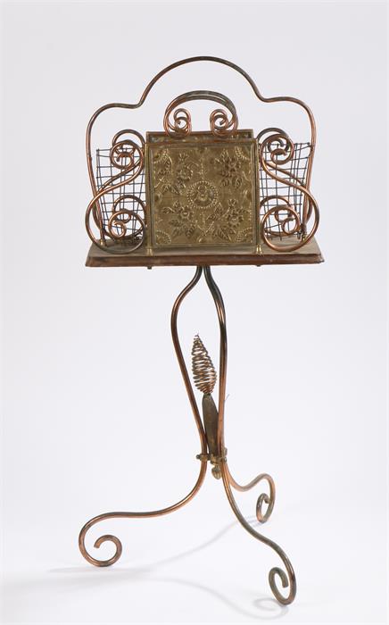 Benson taste magazine rack, with arched top above the rack and arched base with scroll feet