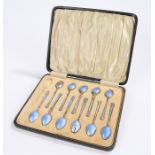 Set of eleven George V silver and enamel teaspoons, Birmingham 1922/23, maker Henry Clifford