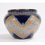 Royal Doulton jardiniere, with pierced rim, the blue and light brown ground with raised beaded,