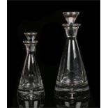 Two Elizabeth II clear glass decanters with silver caps and collars, Birmingham 2004, maker W I