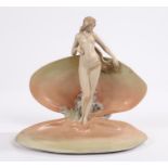 Austrian porcelain figure depicting a nude female with long flowing hair emerging from a clam shell,