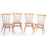 Set of four Ercol light blond elm and beech candlestick dining chairs, with curved cresting rails,