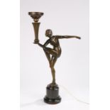 Art Deco bronze lamp, depicting a scantily clad female dancer standing on one leg, her right arm