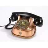 Belgian FTR telephone set, with black plastic hand receiver, copper mounted body with brass dial