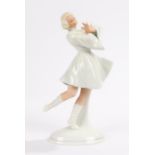 Schaubach Kunst porcelain figure depicting a dancing lady with her arms crossed and her right leg