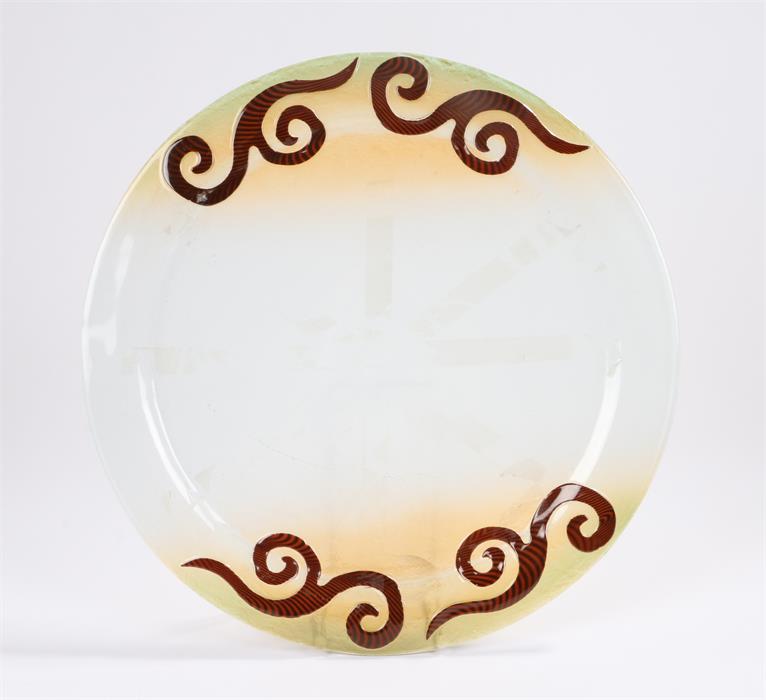 Frosted glass charger, the border with red and black scroll decoration, 39.5cm diameter