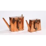 Two copper pots with hinged covers, the side handles numbered 2 and 4
