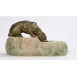 Art Deco spelter and marble ashtray, with depiction of a lioness drinking from a pool, 16.5cm