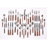 Quantity of 1960's wooden handled flatware to include dessert spoons, table forks, teaspoons,