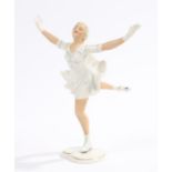 Schaubach Kunst porcelain figure depicting an ice skating lady with her arms and right leg