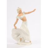 Schaubach Kunst porcelain figure depicting a dancing lady with her left hand outstretched, blue