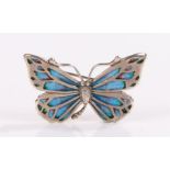 20th century silver Brooch by Norman Grant, in the form of a butterfly with turquoise enamel wings