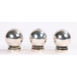 Georg Jensen sterling silver pepper pots and matching salt pot, of bulbous form, the pepper pots