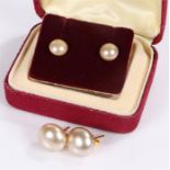 Two pairs of 9 carat gold and pearl earrings, housed in a Lotus box