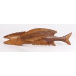 Pitcairn Island souvenir, a carved teak flying fish, made by Wallace Warren, 35cm