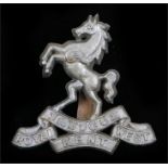 World War Two plastic economy cap badge to the Queens Own Royal West Kent Regiment, in silver
