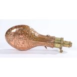 Copper and brass powder flask by Sykes, the body with embossed acanthus leaf and scroll