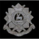 World War Two plastic economy cap badge to the Bedfordshire and Hertfordshire Regiment, in silver