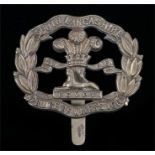 World War One brass economy O/R's cap badge to the South Lancashire Regiment, slider to the reverse