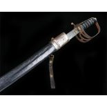 20th Century Indian sword, the sword with acid etched blade, leather bound grip, leather scabbard