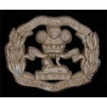 WW2 plastic economy cap badge to the South Lancashire Regiment (Prince of Wales Volunteers), in