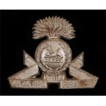 WW2 plastic economy cap badge to the Lancashire Fusiliers, in light bronze, two blades to the