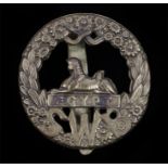 World War One brass economy O/R's cap badge to the South Wales Borderers, slider to the reverse